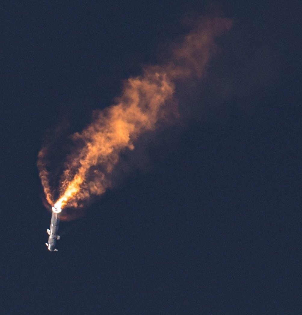 Starship upper stage under power at high altitude during an integrated flight test
