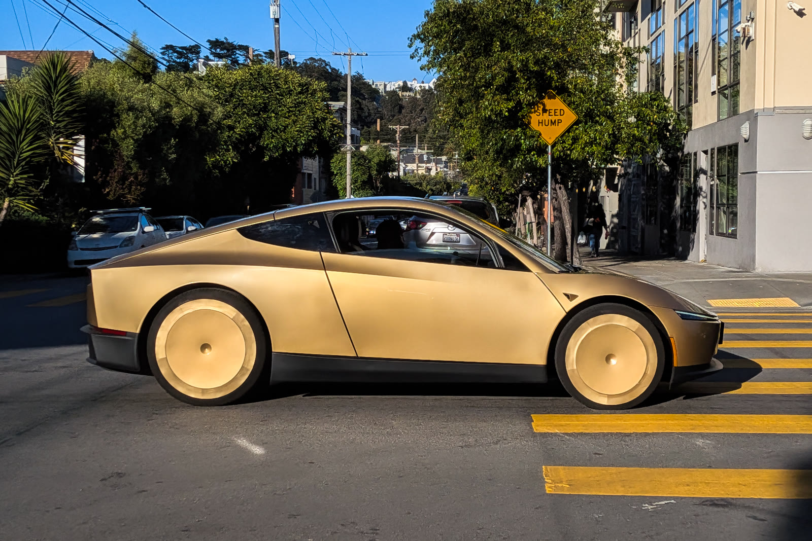 Tesla Cybercab driving on a San Francisco street in June 2026