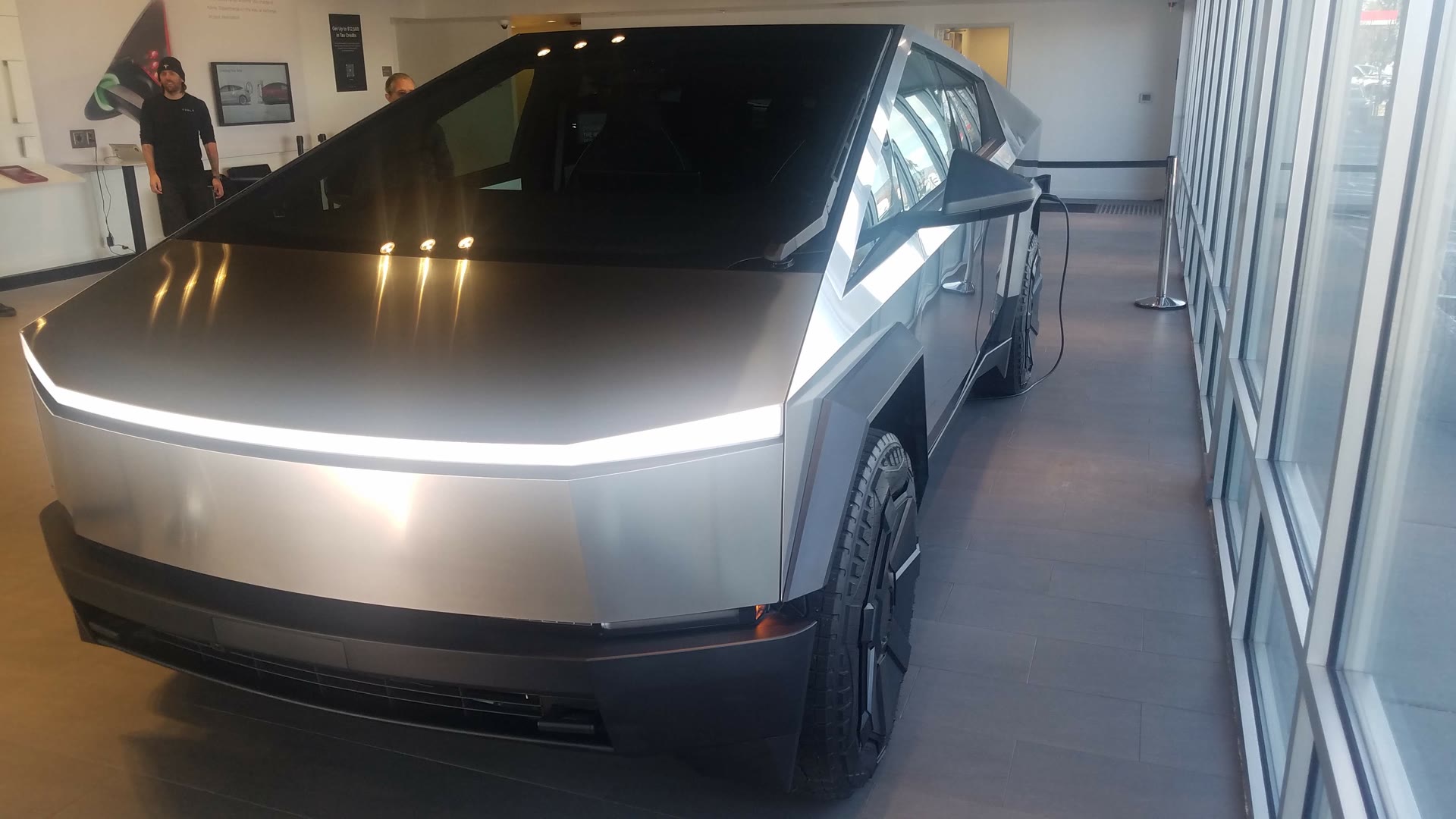 Production-level 2023 Tesla Cybertruck on display at a Tesla showroom